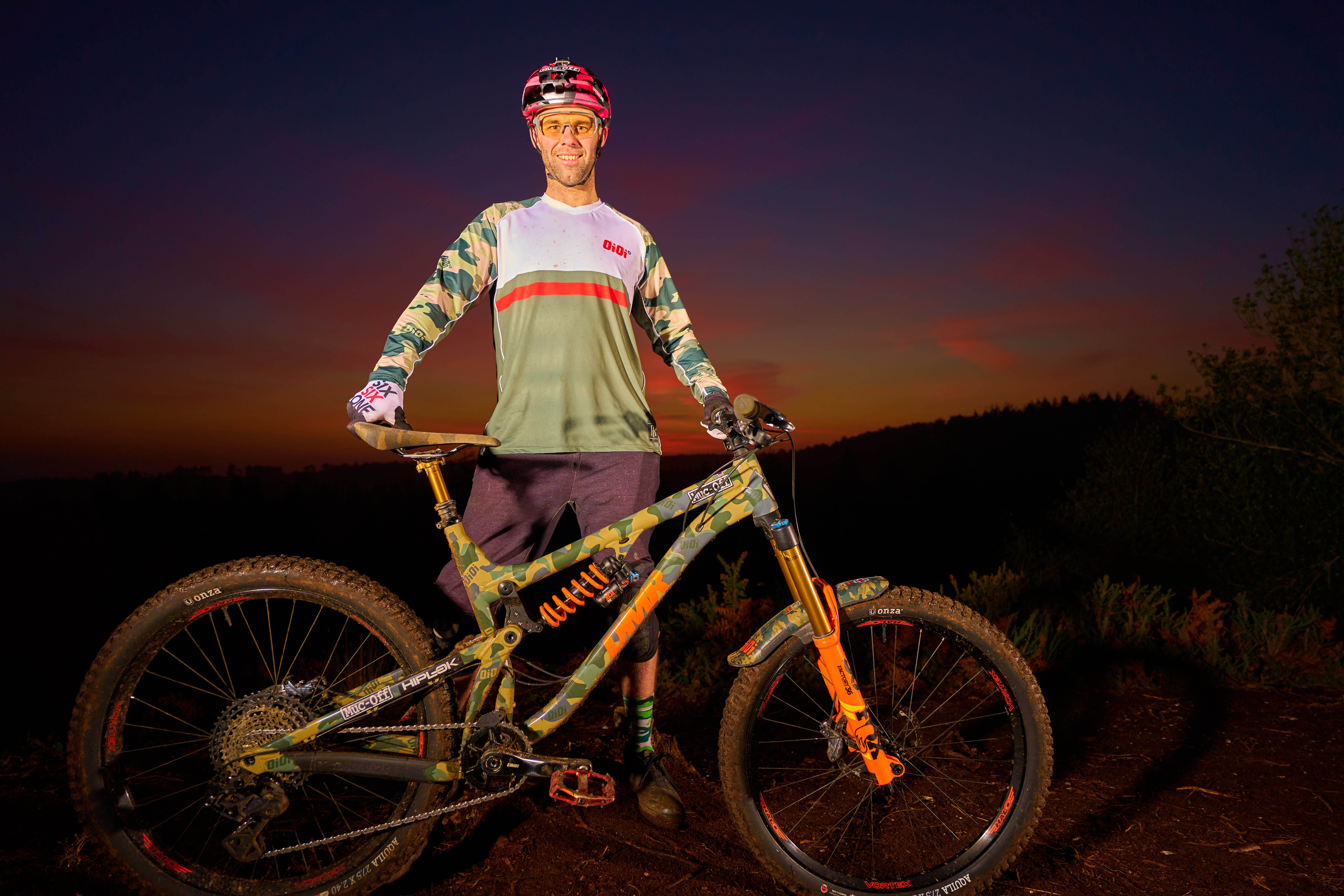 Ben Deakin at night with bike