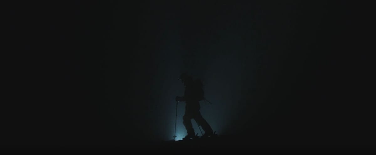 Kieran Nikula night time skiing silhouette   