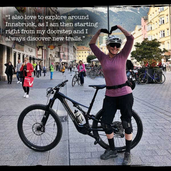 Female in front of mountain bike in Innsbruck