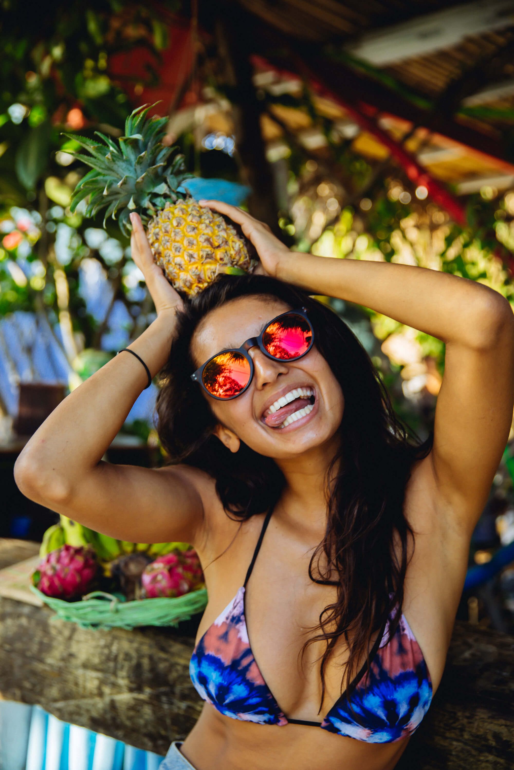 Nathalya enjoying some pineapple with her Melon Echo Sunglasses
