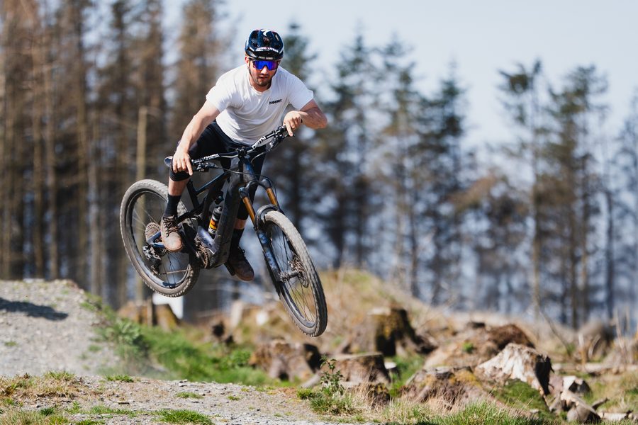 Rider in dense forest wearing Melon photochromic